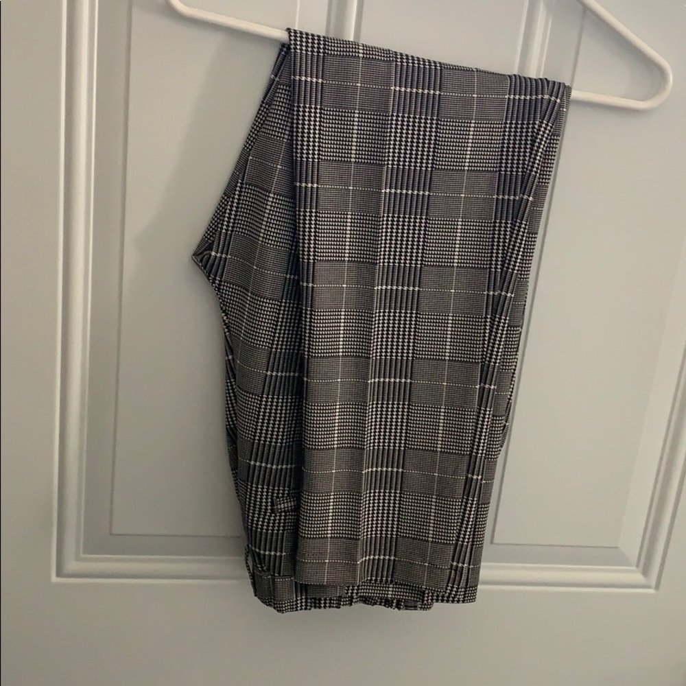 Black and white skinny legged slacks
